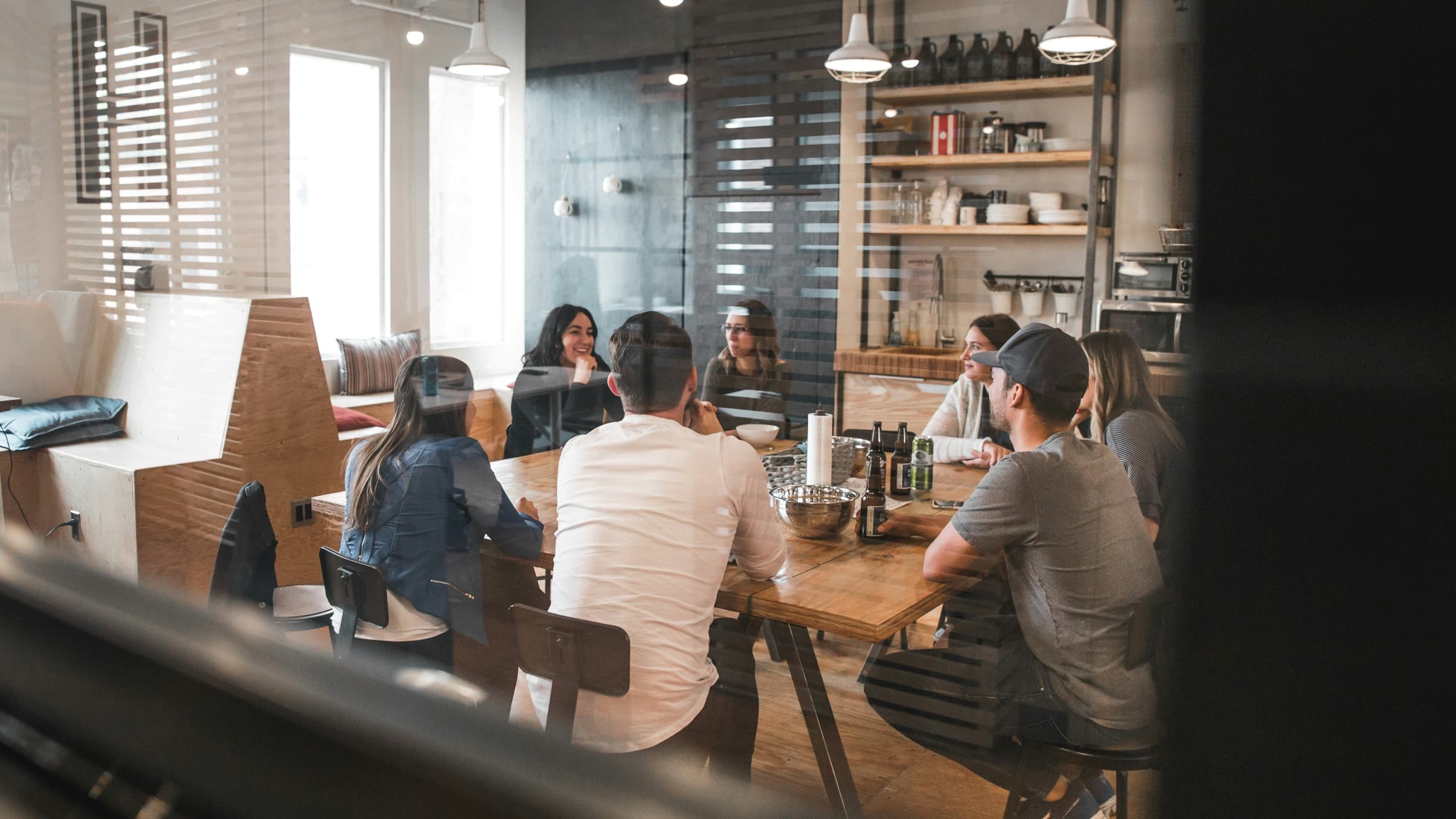 people talking around a table