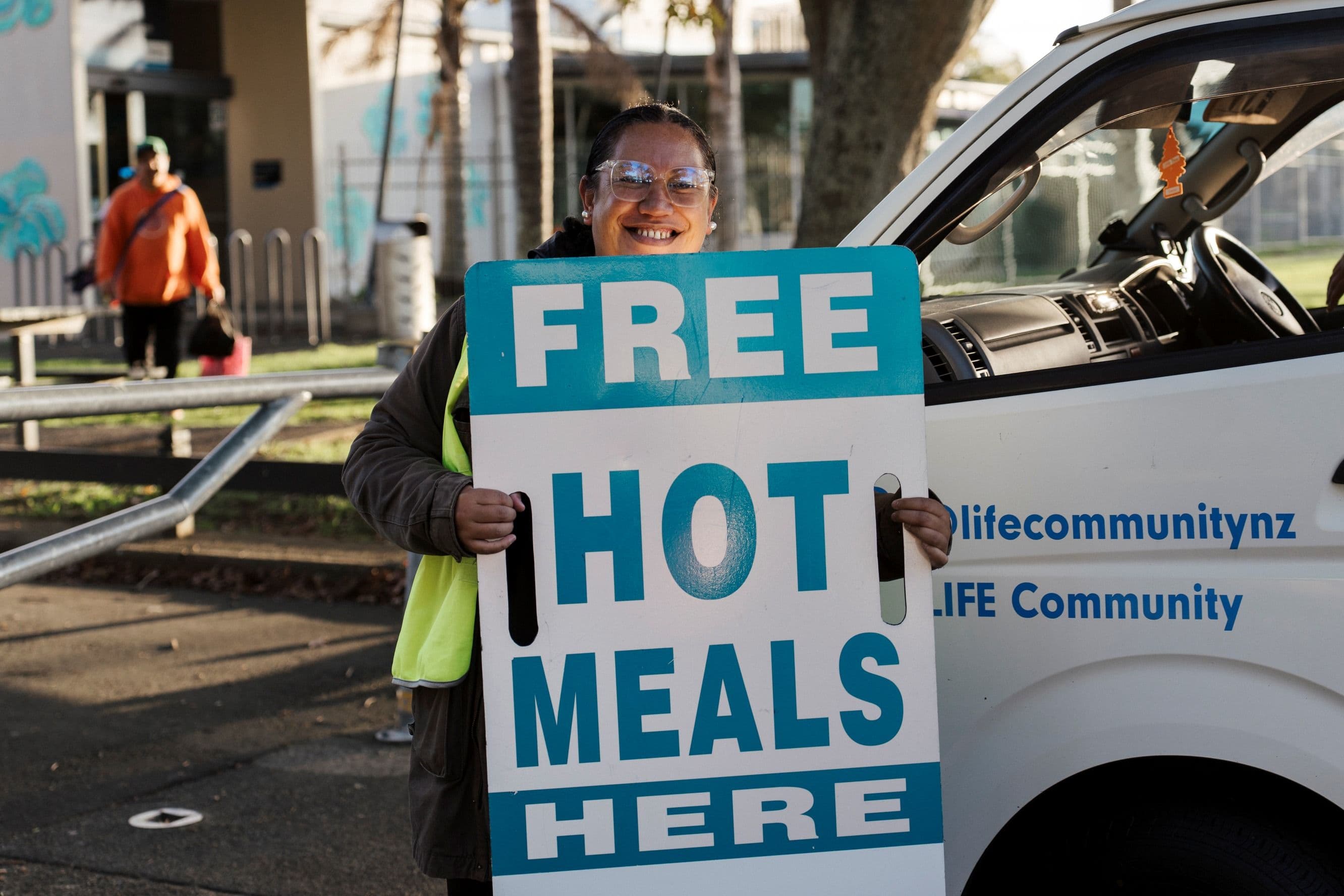 Person welcoming all who need a hot meal