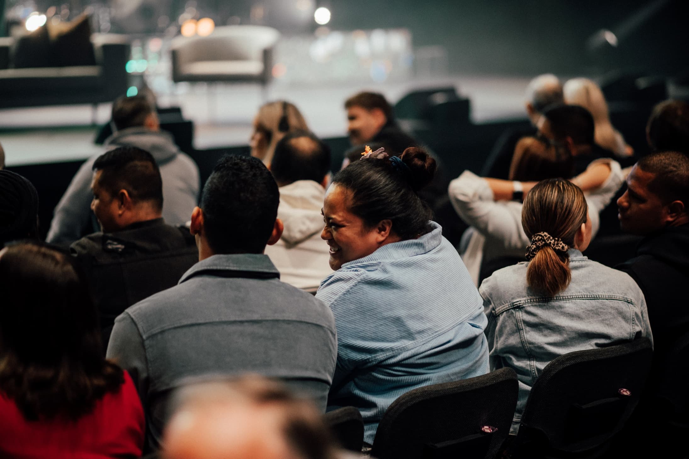 Couple at Marriage Retreat with the woman smiling at the man