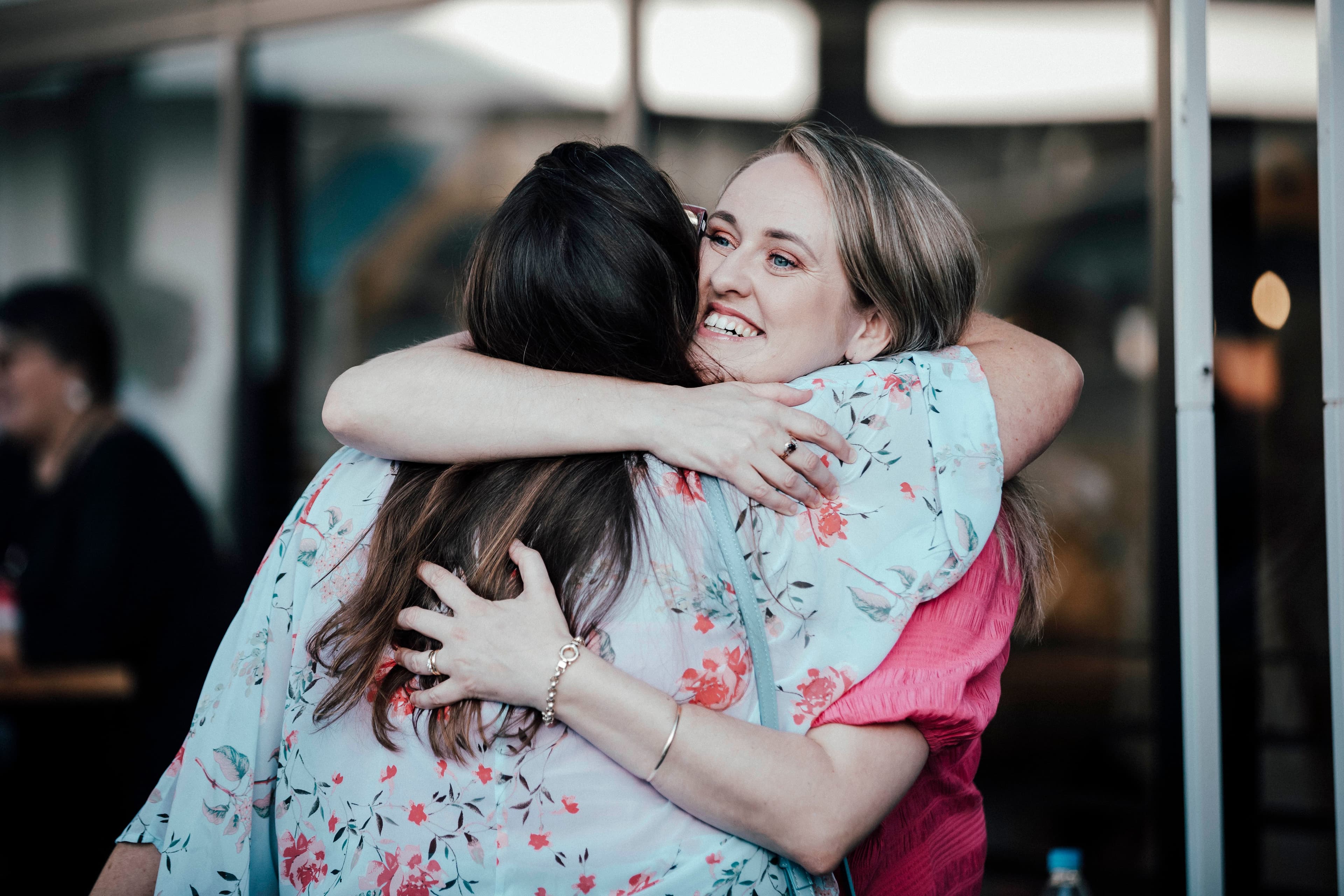 Two women hugging